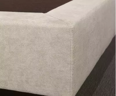 Détail du tissu du sommier écru