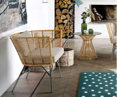 Fauteuil Berta en acier et rotin, tissage fait main