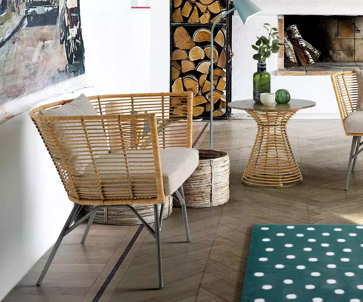 Fauteuil Berta en acier et rotin, tissage fait main Fauteuil Berta en acier et rotin, tissage fait main