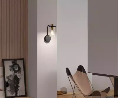 Applique Murale Taula coloris noir et laiton éclaire et réchauffe chaque pièce de votre maison