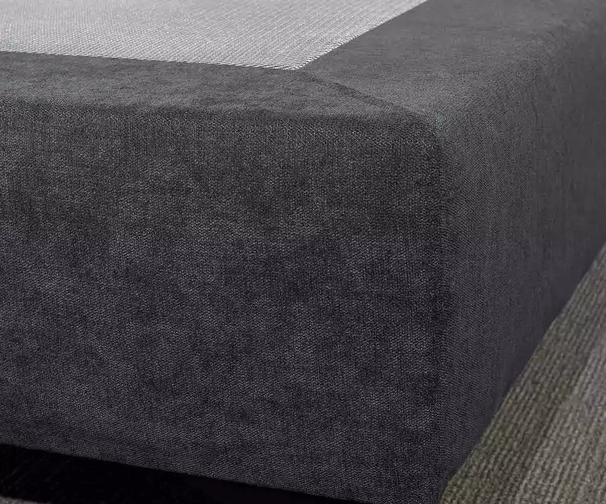Détail du tissu bleu du sommier tapissier Détail du tissu bleu du sommier tapissier
